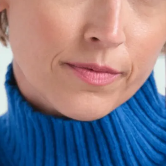 The lower half of a woman’s face showing her nose, lips, and chin with the text: Actual patient. Individual results may vary.